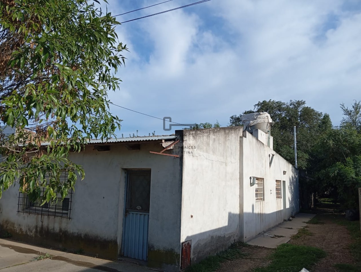Casa y Local Comercial en Venta